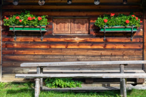 External facade of a typical alpine hut on the Incisa meadows, Dolomites, Corvara in Badia, Bolzano, South Tyrol, Itay External facade of a typical alpine hut on the Incisa meadows, Dolomites, Corvara in Badia, Bolzano, South Tyrol, Itay